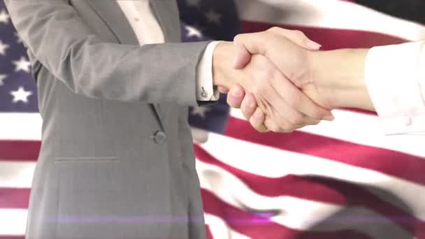 Digital Composite Von Business Handshake Gegen Amerikanische Flagge — Stockvideo