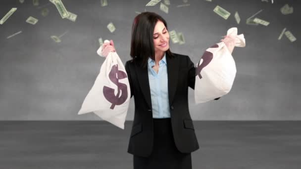 Composite Video Smiling Businesswoman Holding Money Bags — Stock Video