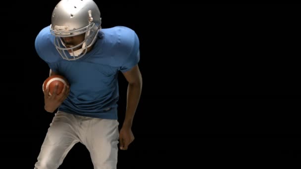 Ernstige American Football Speler Aan Pakken Voor Bal Slow Motion — Stockvideo