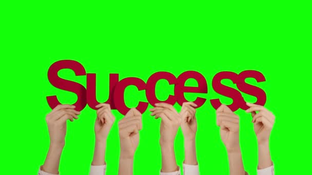 Hands Holding Success Green Background — Stock Video