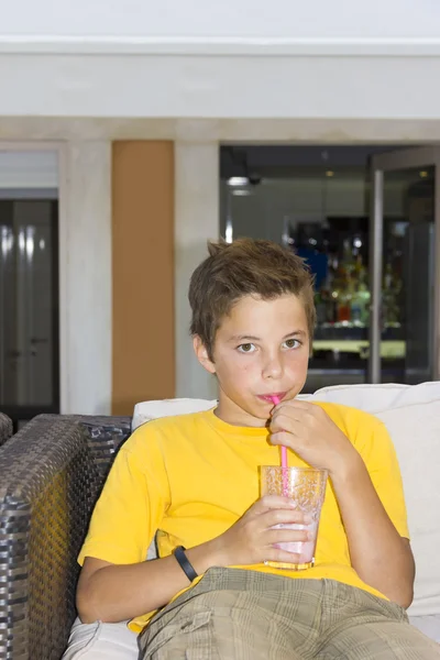 Adorable boys with glasses of milkshake — Stock Photo, Image