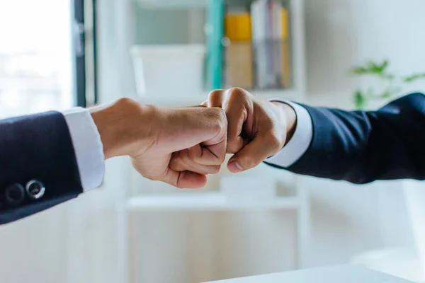 Deal. business man investor joining hands with partner after finishing up business meeting in meeting room office, partner, financial, teamwork, job interview, partnership, contract agreement concept