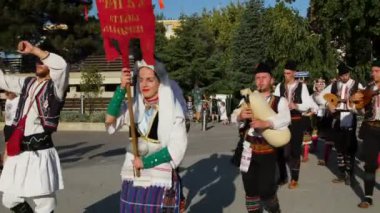 TULCEA, ROMANIA - AUGUST 08: Macedonian national costumes parade at the International Folklore Festival for Children and Youth - Golden Fish on August 08, 2022 in Tulcea, Romania