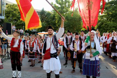 TULCEA, ROMANIA - AUGUST 08: Macedonian group of dancers in traditional costumes at the International Folklore Festival for Children and Youth - Golden Fish on August 08, 2022 in Tulcea, Romania