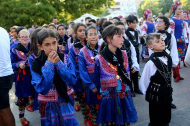 TULCEA, ROMANIA - AUGUST 08: Turkish group of dancers in traditional costumes at the International Folklore Festival for Children and Youth - Golden Fish on August 08, 2022 in Tulcea, Romania