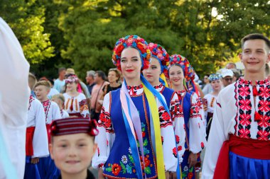 TULCEA, ROMANIA - AUGUST 08: Ukrainian group of dancers in traditional costumes at the International Folklore Festival for Children and Youth - Golden Fish on August 08, 2022 in Tulcea, Romania