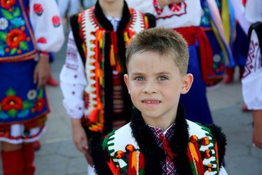 TULCEA, ROMANIA - AUGUST 08: Ukrainian dancer in traditional costume at the International Folklore Festival for Children and Youth - Golden Fish on August 08, 2022 in Tulcea, Romania