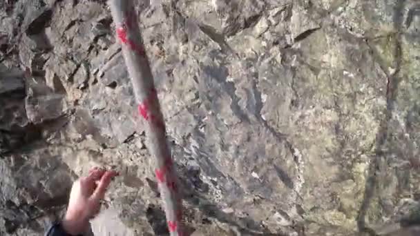 Rock climbing in the first person. The guy goes up — Stok video