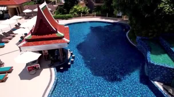 Drone view of the hotel with a pool. — ストック動画