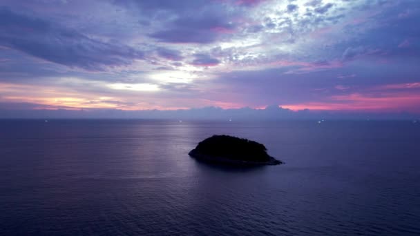 Purple sunset with a view of the sea and clouds. — 비디오