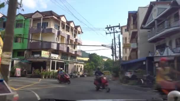 View from the cab of the car on the city road. — Wideo stockowe