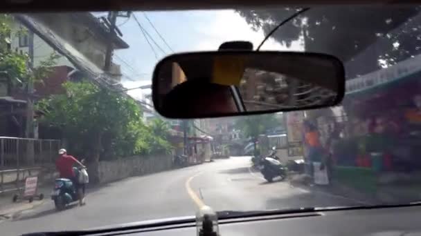View from the cab of the car on the city road. — Wideo stockowe