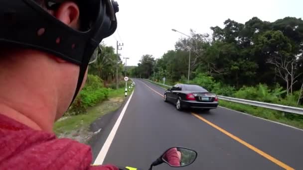 View of the road and the side mirror of motorcycle — Wideo stockowe