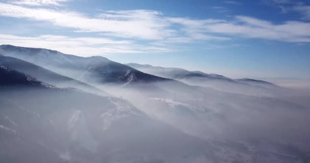 Fog Rises Slopes Mountains White Clouds Blue Sky Snow Hills — Stock Video