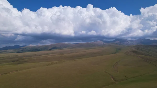 Big White Clouds Green Hills Mountains Top View Drone Endless — Stockfoto