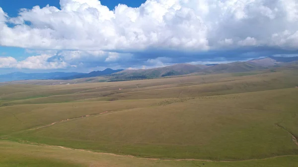Big White Clouds Green Hills Mountains Top View Drone Endless — Stock Fotó