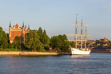 Stockholm, Sweden - 29 May 2016: View of the af Chapman, Dunboyne, full-rigged steel ship moored on the western shore of the islet Skeppsholmen in central Stockholm. clipart
