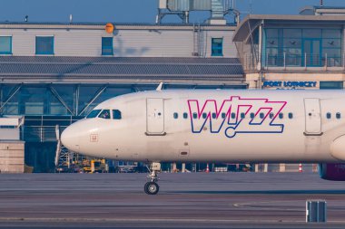 Gdansk, Poland - 11 March 2018: Aircraft line Wizzair taxiing on the airport runway. The Lech Walesa Airport in Gdansk.