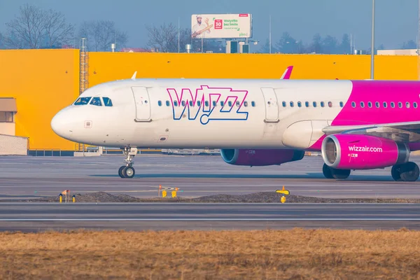Gdansk, Poland - 11 March 2018: Aircraft line Wizzair taxiing on the airport runway. The Lech Walesa Airport in Gdansk.