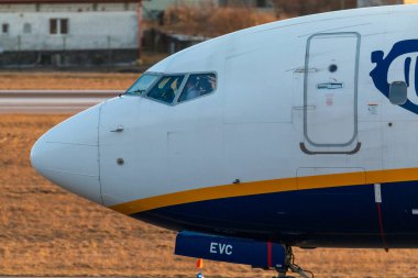 Gdansk, Poland - 21 March 2018: Gdansk, Poland - 11 March 2018: Plane line Ryanair taking off on Lech Walesa Airport in Gdansk. Sunny winter day.