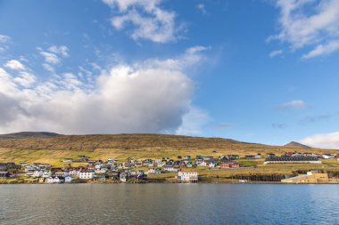 View of the Sandavagur on Streymoy island. A small village situated on the slope of a hill. Faroe Island.