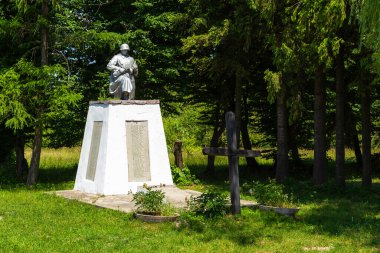 Pidhirtsi, Ukraine - 10 June 2018: A soldier statue in the park at Pidhirtsi Castle.