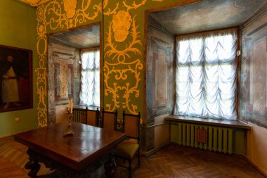 Olesko, Ukraine - 10 June 2018: The rich interior of the Olesko Castle, located about seventy-five kilometers from Lviv, the largest city in western Ukraine.