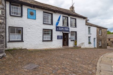 Dent, Cumbria, UK, August 2020 - Facade of a stone building in the village of Dent in the Yorkshire Dales, UK