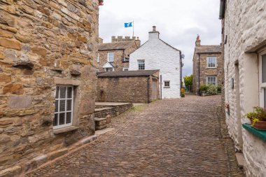 Dent, Cumbria, UK, August 2020 - Facade of a stone building in the village of Dent in the Yorkshire Dales, UK