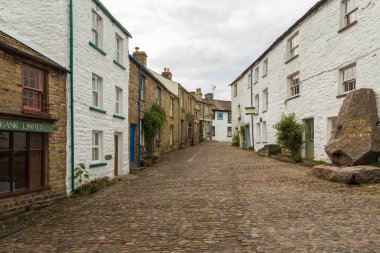 Dent, Cumbria, UK, 12 August 2018 - Facade of a stone building in the village of Dent in the Yorkshire Dales, UK