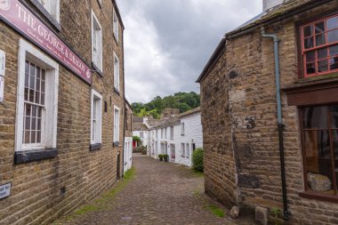 Dent, Cumbria, UK, 12 August 2018 - Facade of a stone building in the village of Dent in the Yorkshire Dales, UK