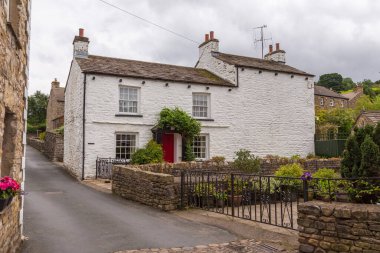 Dent, Cumbria, UK, 12 August 2018 - Facade of a stone building in the village of Dent in the Yorkshire Dales, UK
