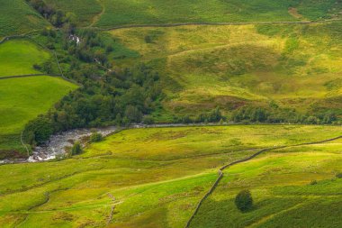 View of the Hardknott Pass, hill pass between Eskdale and the Duddon Valley in the Lake District National Park, Cumbria, England.