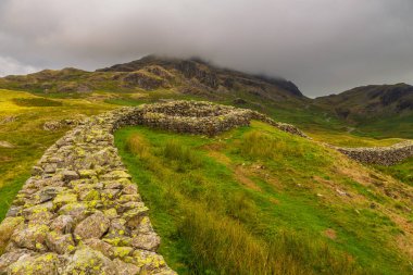 View of the Hardknott Roman Fort , archeological site, the remains of the Roman fort Mediobogdum. Lake District National Park, Cumbria, England.