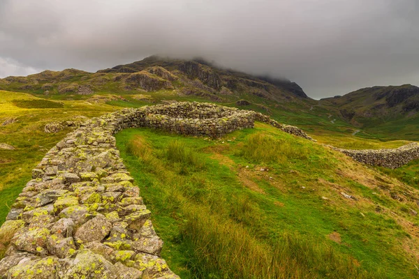 View of the Hardknott Roman Fort , archeological site, the remains of the Roman fort Mediobogdum. Lake District National Park, Cumbria, England.