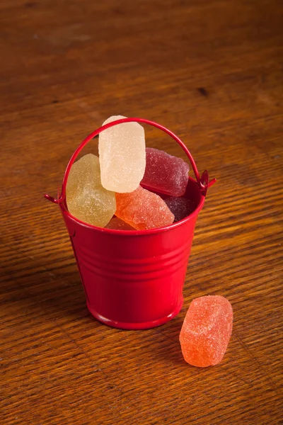 Small bucket with candy — Stock Photo, Image