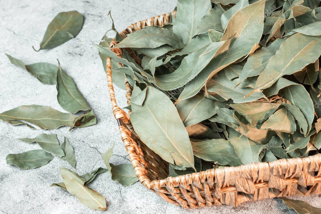 Food background. Bay leaf, natural antiseptic, antioxidant, acne remedy, macronutrients for skin and hair. Herbal medicine. Mediterranean spice