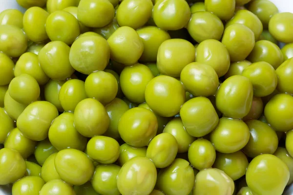 Matgrönsaksbakgrund Gröna Ärtor Burk Närbild Källa Till Vitamin Och Aminosyror — Stockfoto