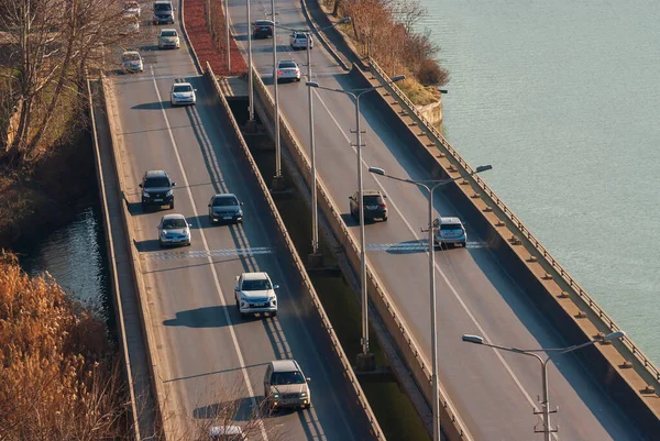 Georgia, Tbilisi - December 31, 2021: Traffic on city street.