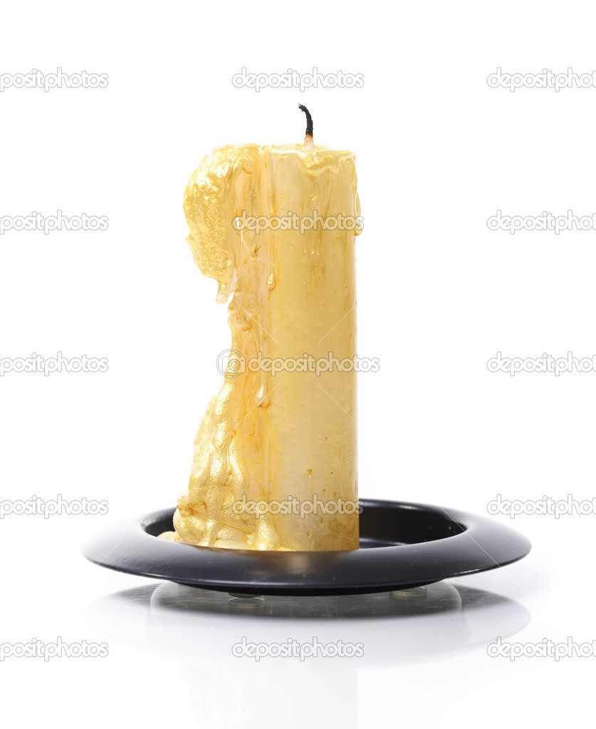 Burned candle isolated