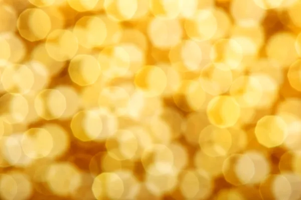 Goldene schöne Flecken Bokeh als Hintergrund — Stockfoto