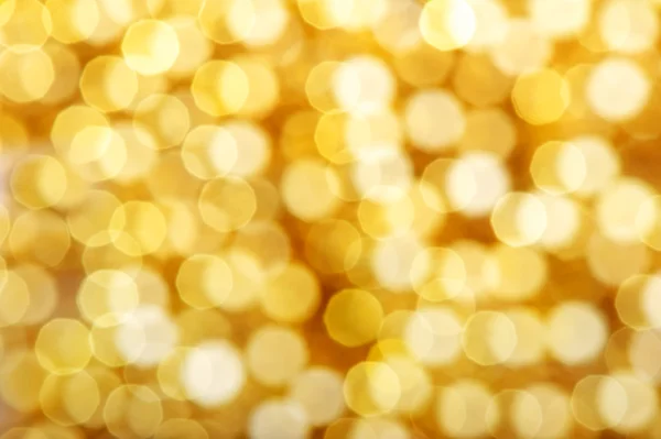 Goldene schöne Flecken Bokeh als Hintergrund — Stockfoto