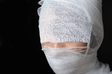 dikey, bandajlı yüz