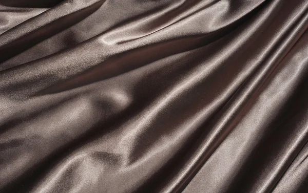 Dark fabric with folds — Stock Photo, Image