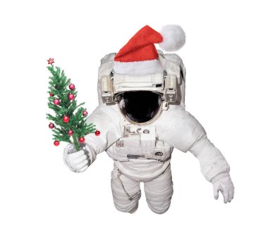 Astronot, Noel ağacını beyaz arka planda izole eder. Bu görüntünün elementleri NASA tarafından desteklenmektedir