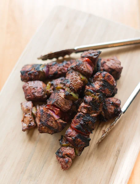 Beef kebab on wood Royalty Free Stock Images