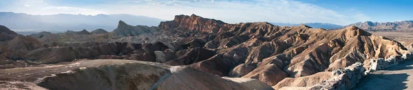 Solnedgang ved Zabriskie Point i Death Valley - Stock-foto