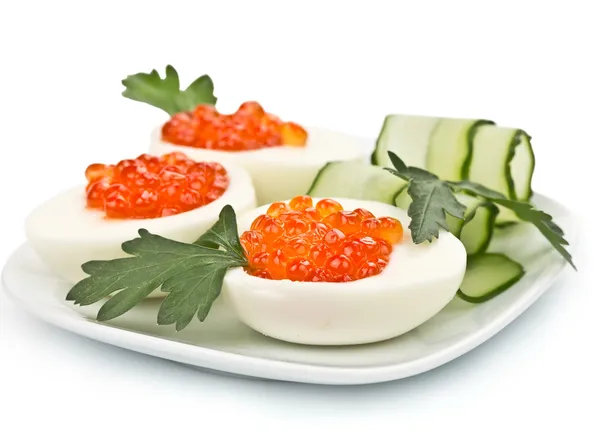 Três ovos recheados com caviar — Fotografia de Stock
