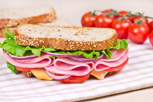 Sandwiches on a wooden board — Stock Photo, Image