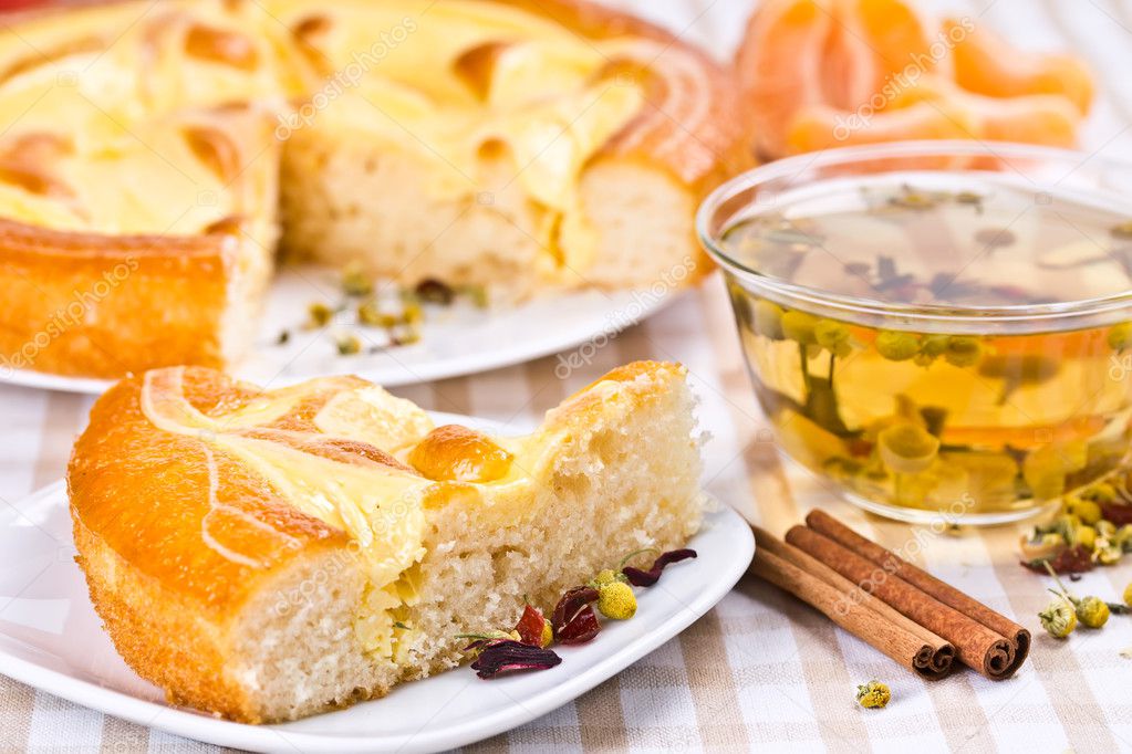 pie, tea and slices of mandarin